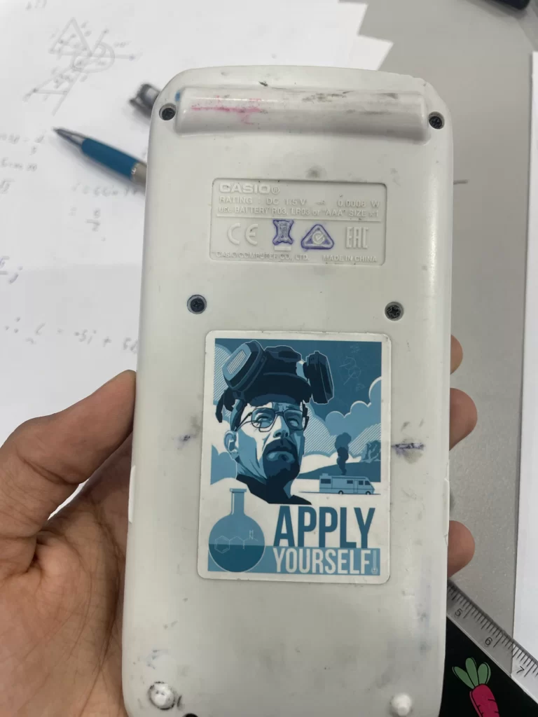 sticker on calculator saying "apply yourself"